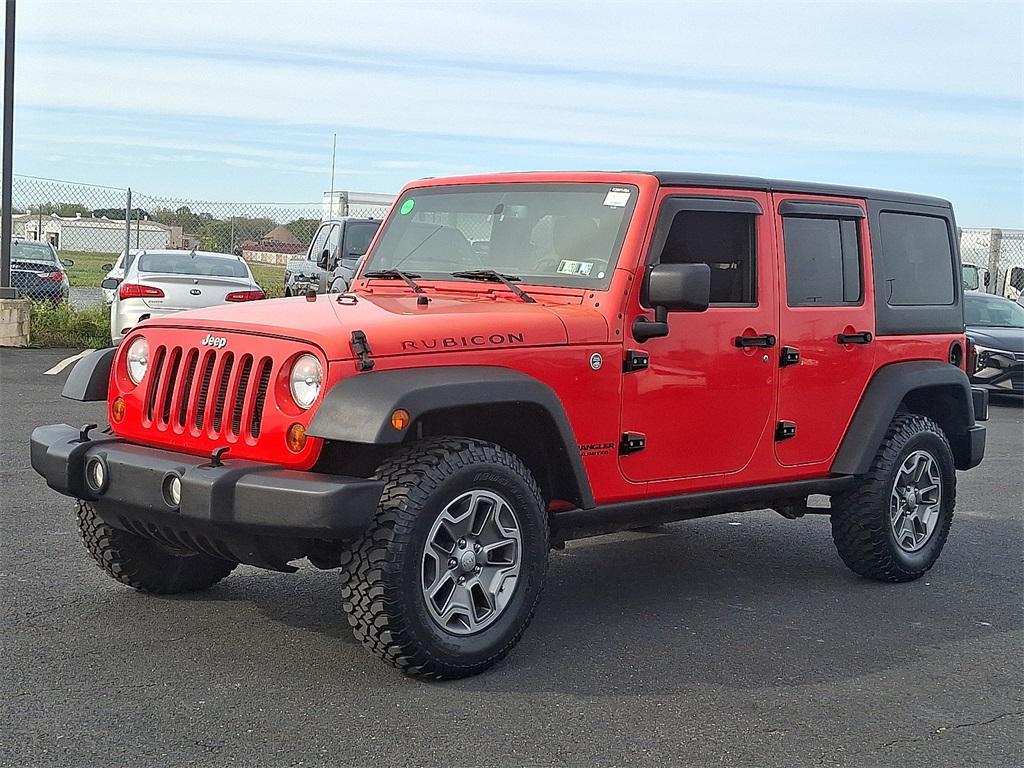 used 2013 Jeep Wrangler Unlimited car, priced at $17,640