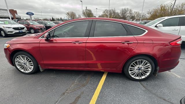 used 2014 Ford Fusion car, priced at $7,000