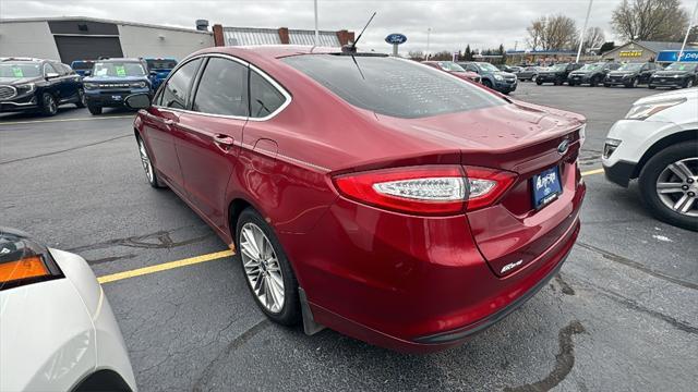 used 2014 Ford Fusion car, priced at $7,000