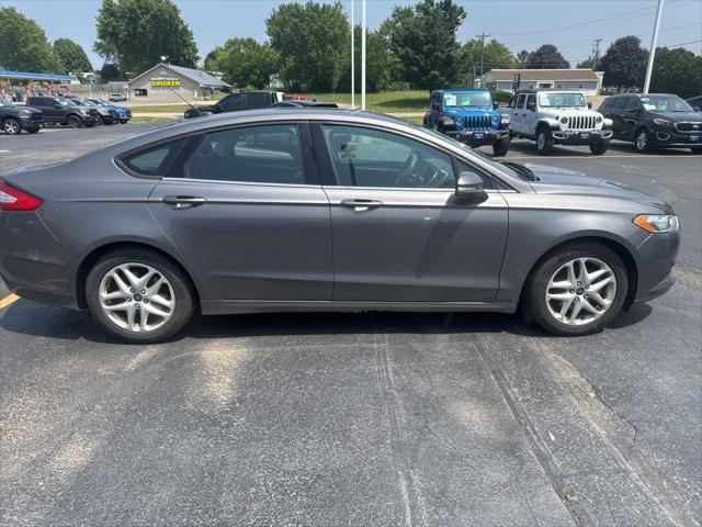used 2013 Ford Fusion car, priced at $7,000