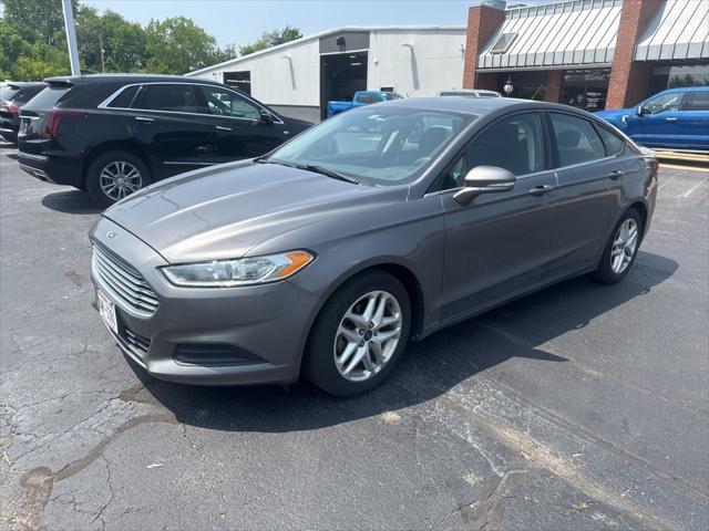 used 2013 Ford Fusion car, priced at $7,000