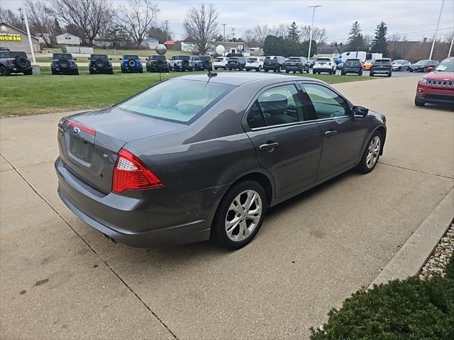 used 2012 Ford Fusion car, priced at $6,000