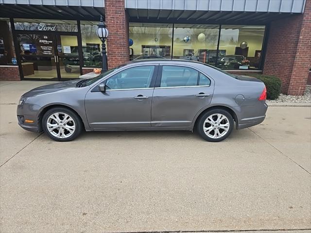 used 2012 Ford Fusion car, priced at $6,000