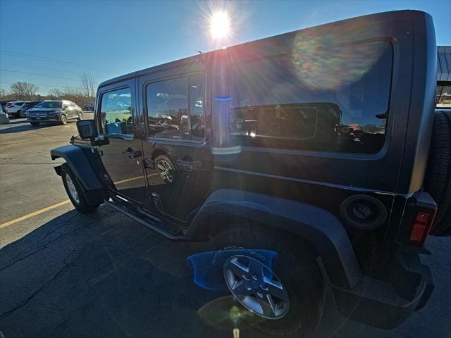 used 2014 Jeep Wrangler Unlimited car, priced at $14,000