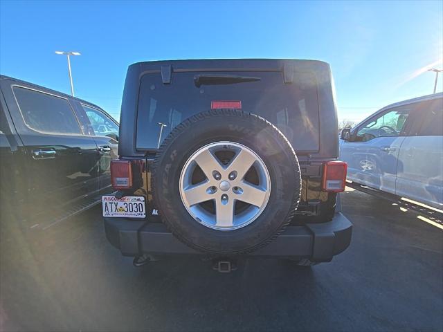 used 2014 Jeep Wrangler Unlimited car, priced at $14,000