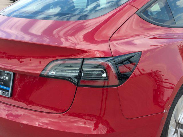 used 2022 Tesla Model 3 car, priced at $23,600