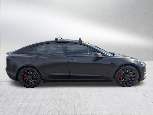 used 2022 Tesla Model 3 car, priced at $27,533