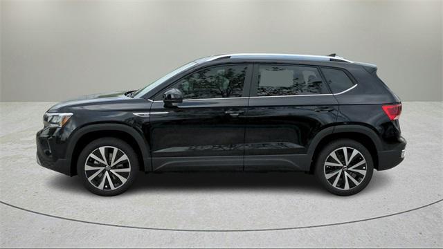 used 2023 Volkswagen Taos car, priced at $23,414