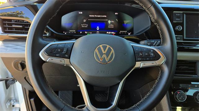 used 2024 Volkswagen Taos car, priced at $18,500