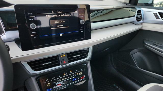 new 2025 Volkswagen Taos car, priced at $30,722