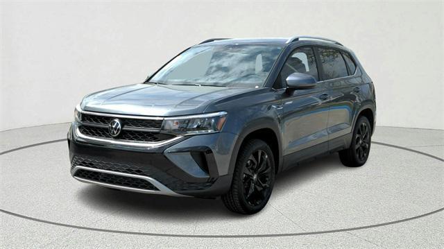 used 2023 Volkswagen Taos car, priced at $18,500