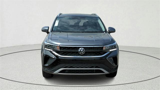 used 2023 Volkswagen Taos car, priced at $18,500