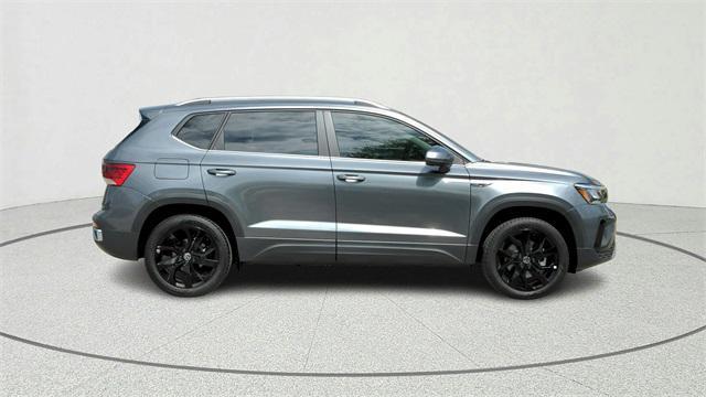 used 2023 Volkswagen Taos car, priced at $18,500