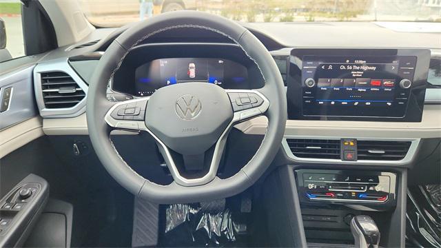 new 2025 Volkswagen Taos car, priced at $29,631