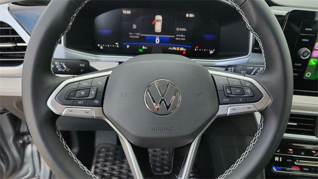used 2025 Volkswagen Taos car, priced at $26,995