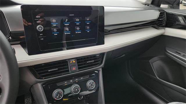 new 2025 Volkswagen Taos car, priced at $27,094