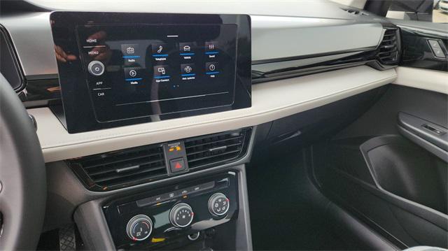new 2025 Volkswagen Taos car, priced at $27,094