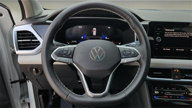 new 2025 Volkswagen Taos car, priced at $29,499