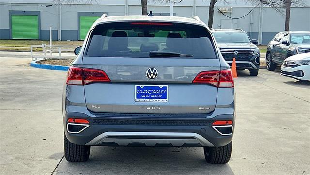 new 2024 Volkswagen Taos car, priced at $32,821