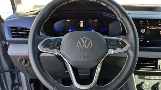 used 2022 Volkswagen Taos car, priced at $19,900