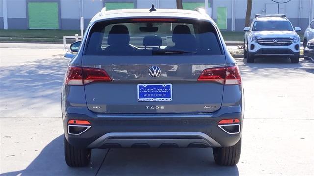 new 2024 Volkswagen Taos car, priced at $33,635