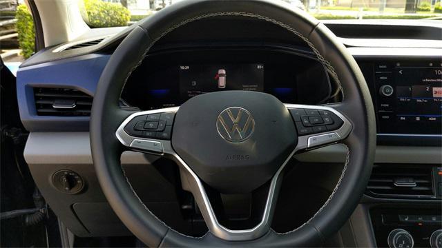 used 2023 Volkswagen Taos car, priced at $23,991
