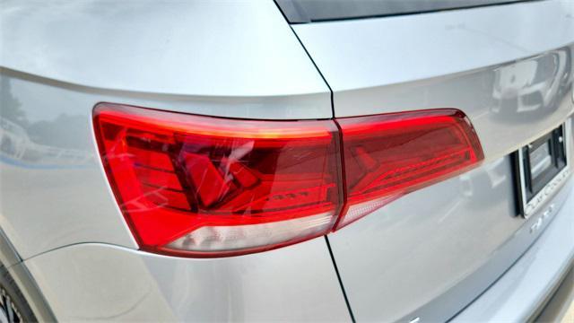 used 2022 Volkswagen Taos car, priced at $22,999