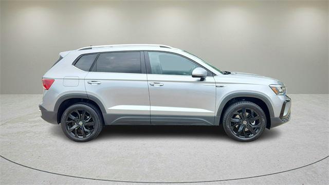 used 2022 Volkswagen Taos car, priced at $22,999