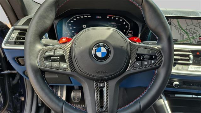 used 2022 BMW M4 car, priced at $57,900