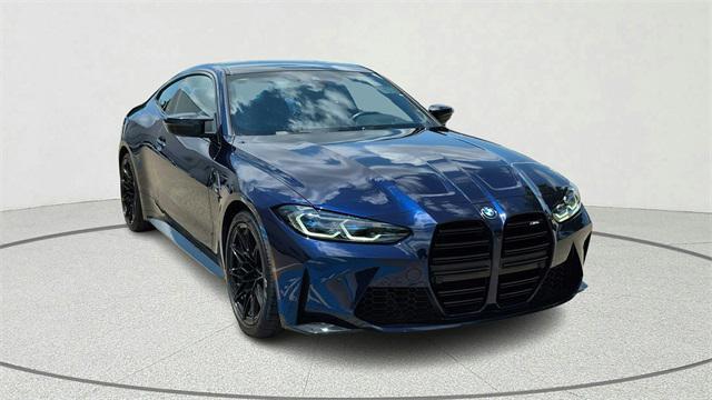 used 2022 BMW M4 car, priced at $57,900