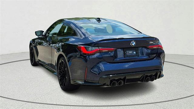 used 2022 BMW M4 car, priced at $57,900