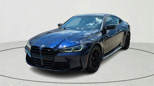 used 2022 BMW M4 car, priced at $57,900