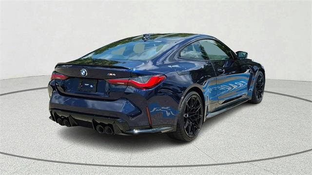 used 2022 BMW M4 car, priced at $57,900