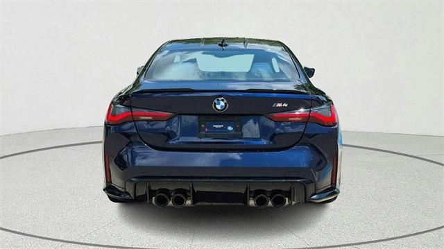 used 2022 BMW M4 car, priced at $57,900