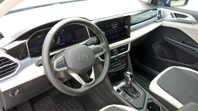 new 2025 Volkswagen Taos car, priced at $28,999