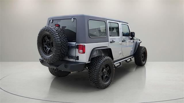 used 2016 Jeep Wrangler Unlimited car, priced at $24,875