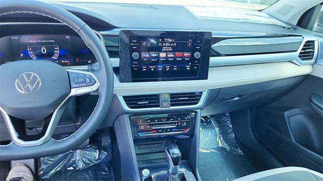new 2025 Volkswagen Taos car, priced at $26,999