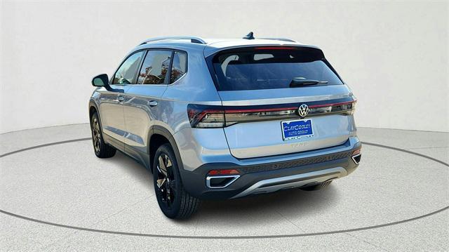 used 2025 Volkswagen Taos car, priced at $28,000