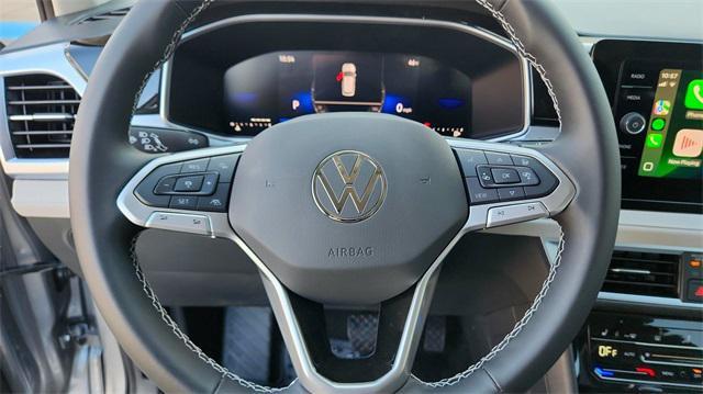 used 2025 Volkswagen Taos car, priced at $28,000