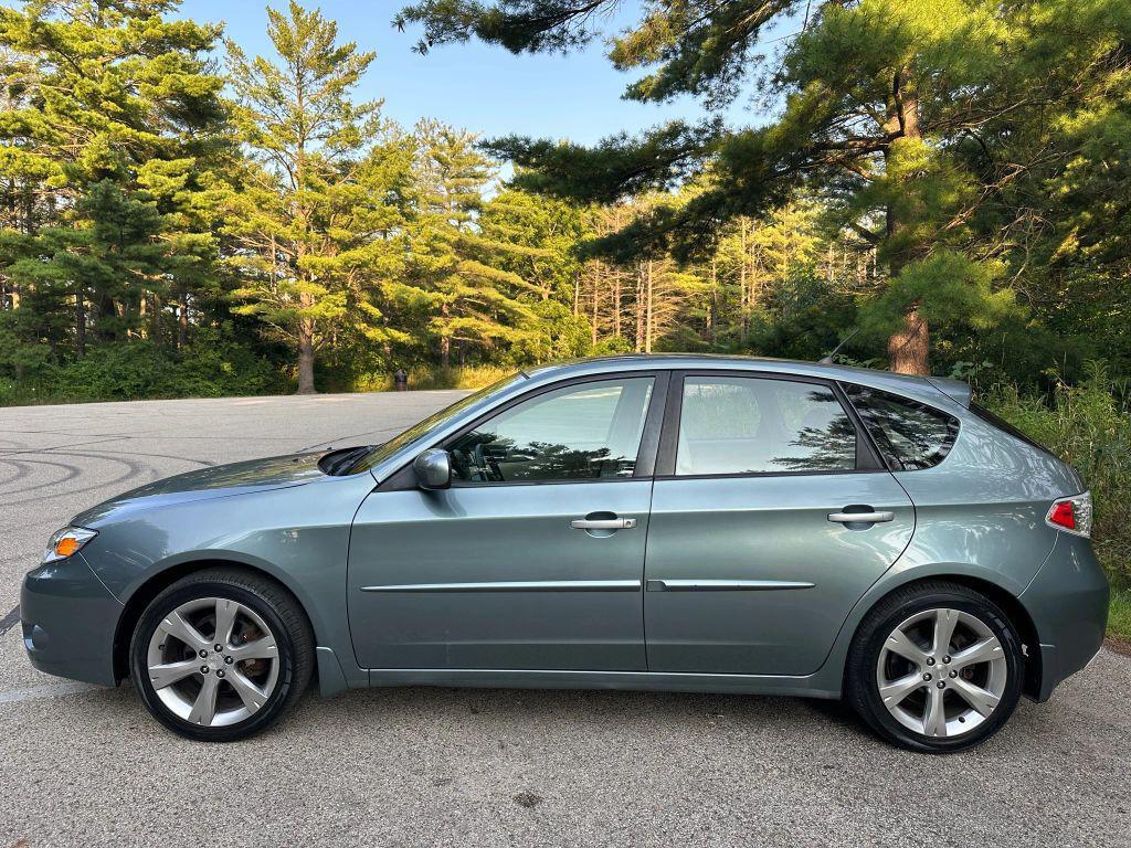 used 2011 Subaru Impreza Outback Sport car, priced at $7,994