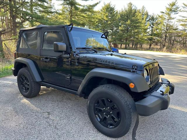 used 2015 Jeep Wrangler car, priced at $14,694