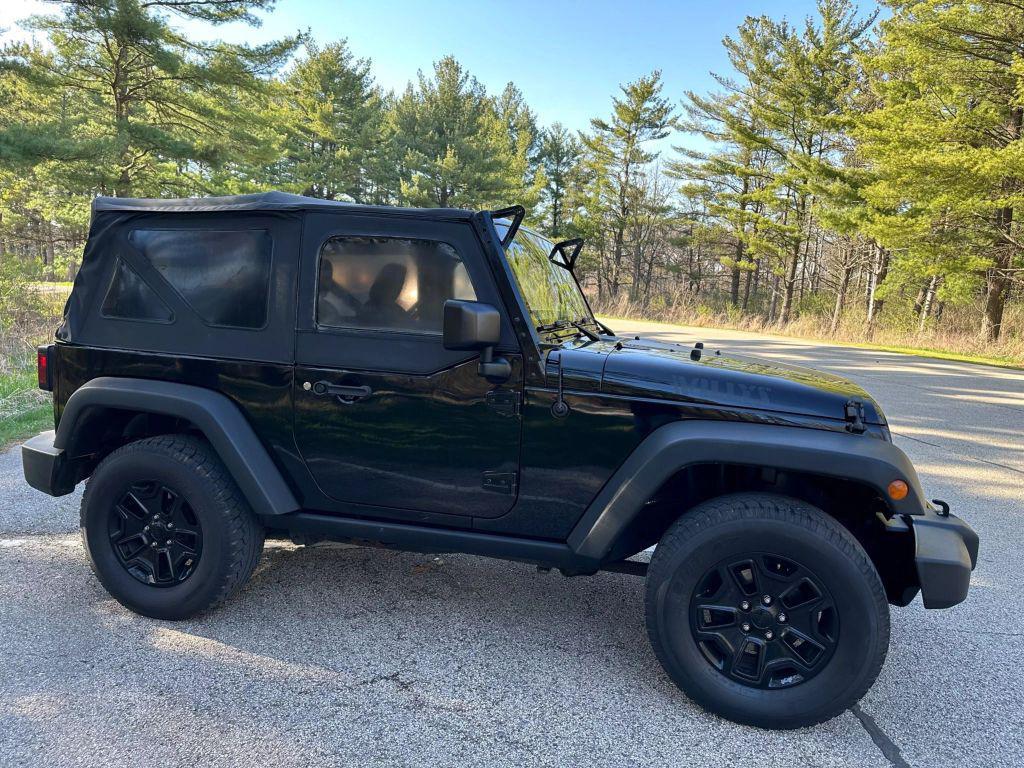 used 2015 Jeep Wrangler car, priced at $13,798