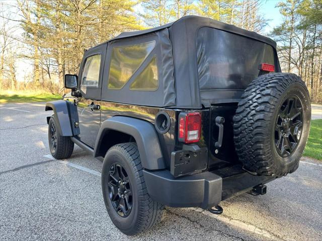 used 2015 Jeep Wrangler car, priced at $14,694