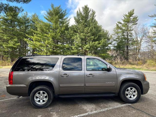 used 2014 GMC Yukon car, priced at $14,990