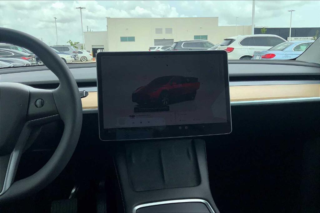 used 2024 Tesla Model Y car, priced at $33,900