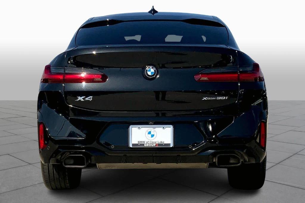 used 2023 BMW X4 car, priced at $39,999