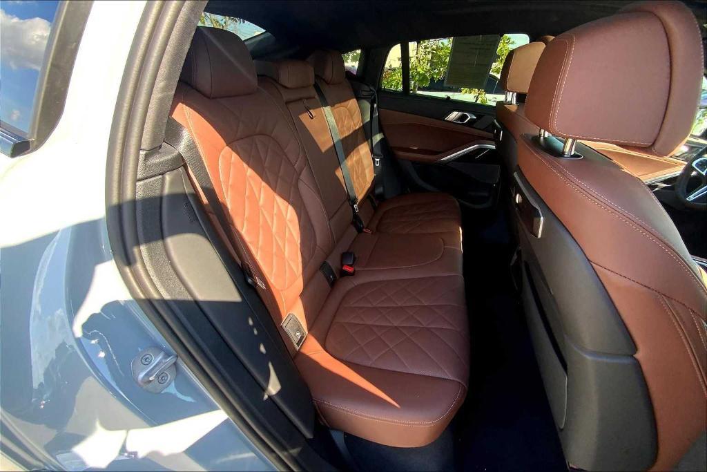 used 2025 BMW X6 car, priced at $83,999