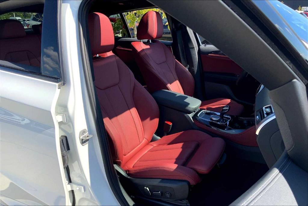 used 2025 BMW X4 car, priced at $67,988
