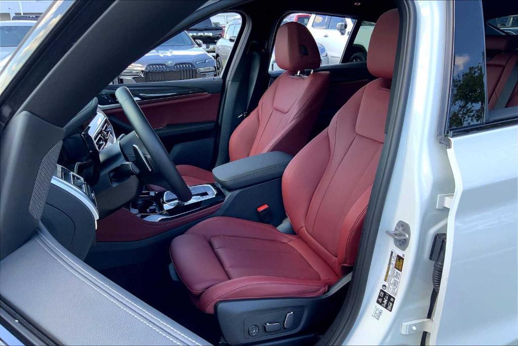 used 2025 BMW X4 car, priced at $67,988
