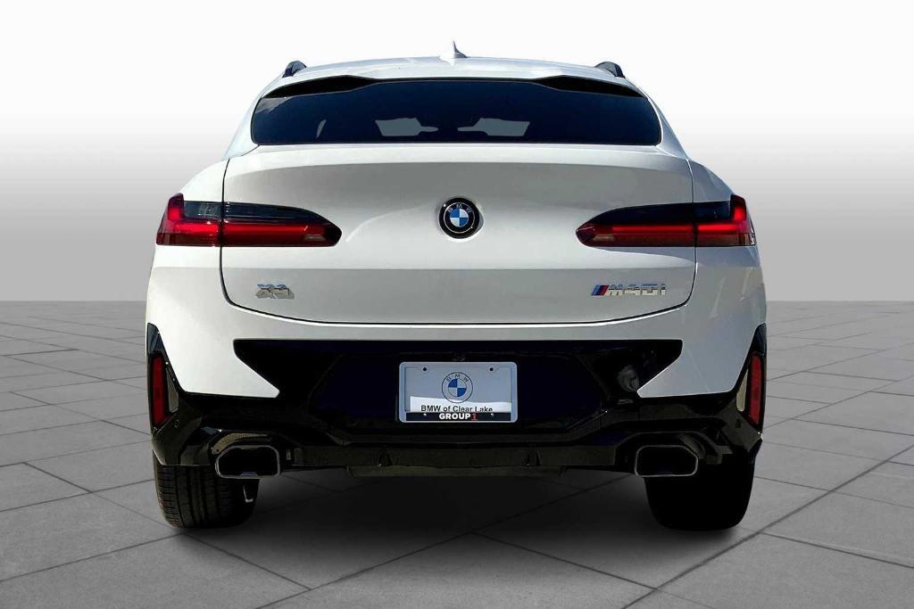 used 2025 BMW X4 car, priced at $67,988